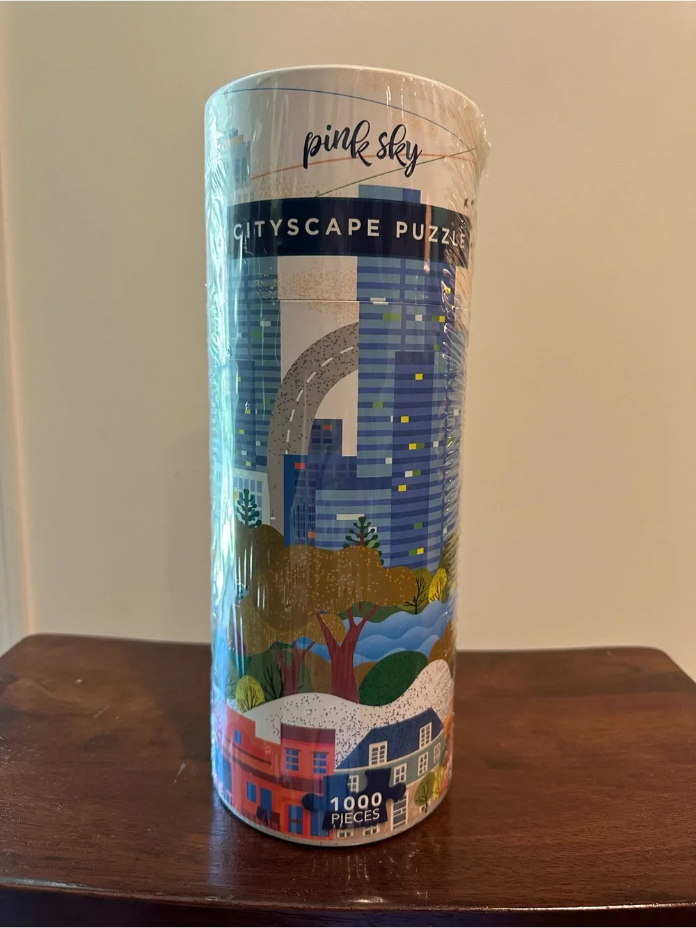 Pink Sky • 1,000 piece puzzle •’contained in a large canister • citiscape